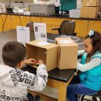 kids engaging in a Family Engineering Activity